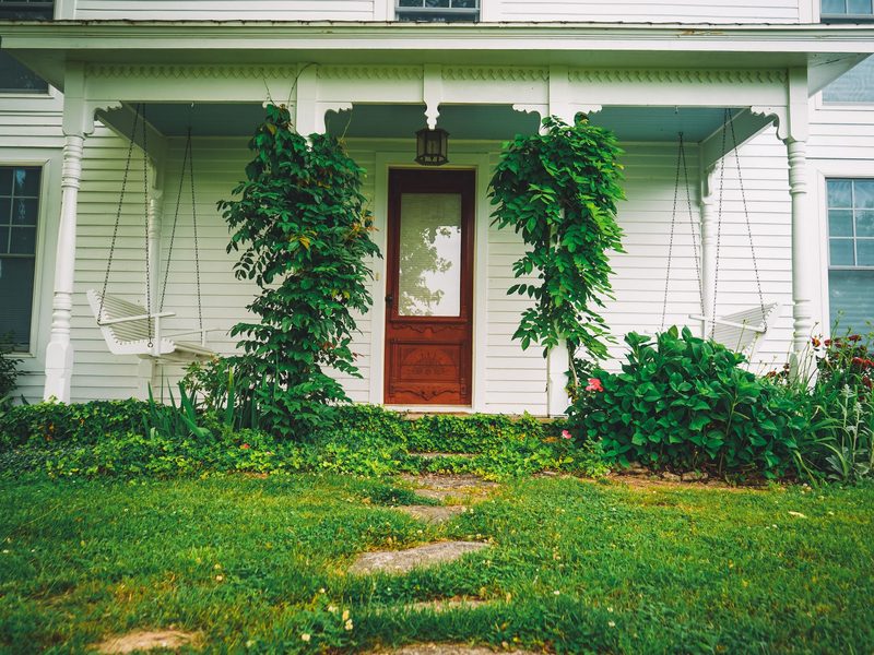 The front porch and entryway of a welcoming residential home