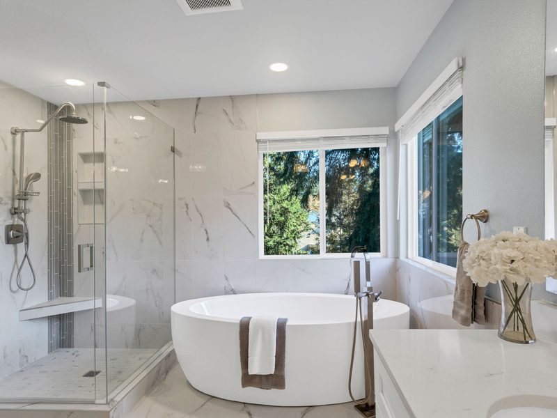 A clean, bright bathroom with a walk-in shower